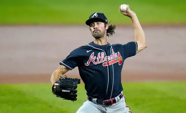 FILE - Atlanta Braves starting pitcher Cole Hamels throws a pitch to the Baltimore Orioles during the second inning of a baseball game, Sept. 16, 2020, in Baltimore. (AP Photo/Julio Cortez, File)