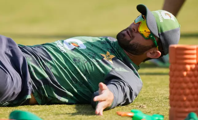 Pakistan's ODI team skipper Shaheen Shah Afridi warm up before start of the first one day international cricket match between Pakistan and Sri Lanka, in Rawalpindi, Pakistan, Tuesday, Nov. 11, 2025. (AP Photo/Anjum Naveed)