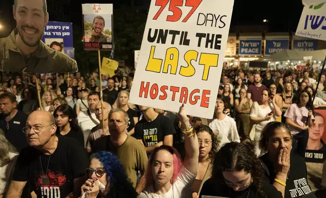 Relatives and supporters of hostages held by Hamas in the Gaza Strip attend a rally calling for their immediate release in Tel Aviv, Israel, Saturday, Nov. 1, 2025. (AP Photo/Mahmoud Illean)