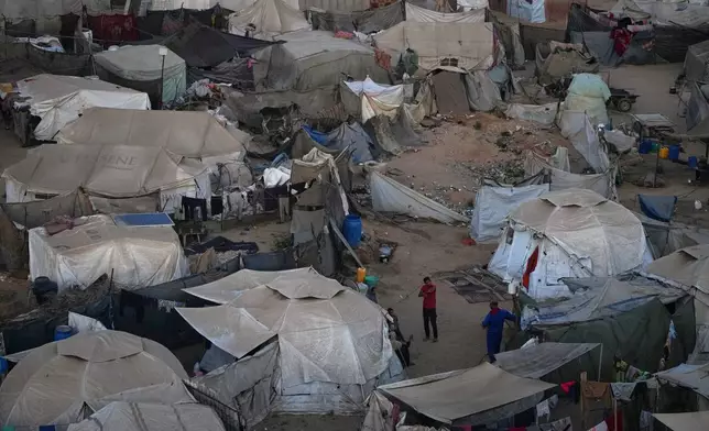 Tents fill a makeshift camp for displaced Palestinians in Zawaida, in the central Gaza Strip, on Saturday, Nov. 1, 2025. (AP Photo/Abdel Kareem Hana)