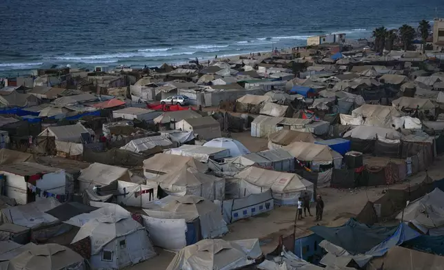 Tents fill a makeshift camp for displaced Palestinians in Zawaida, in the central Gaza Strip, on Saturday, Nov. 1, 2025. (AP Photo/Abdel Kareem Hana)