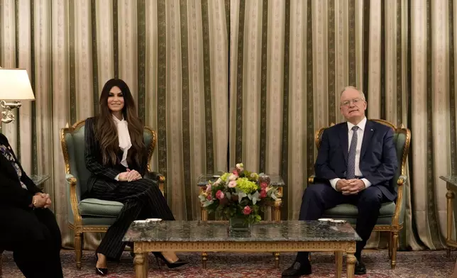 Kimberly Guilfoyle, the new U.S. Ambassador to Greece and first woman to hold the post, speaks with Greek President Constantine Tassoulas during a ceremony to present her diplomatic credentials at the Presidential Palace in Athens, Greece, Tuesday, Nov. 4, 2025. (AP Photo/Petros Giannakouris)