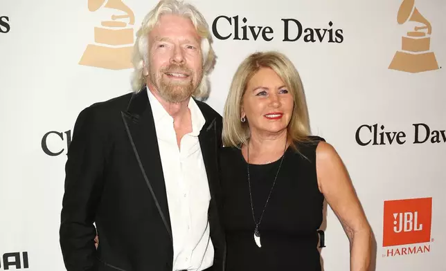 FILE - Richard Branson, left, and Joan Templeman Branson appear at the 2016 Clive Davis Pre-Grammy Gala, in Beverly Hills, Calif., Feb. 14, 2016. (Photo by John Salangsang/Invision/AP, File)