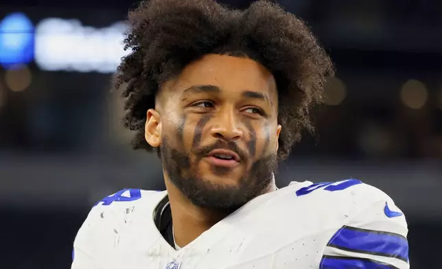 FILE - Dallas Cowboys defensive end Marshawn Kneeland (94) walks off the field after a preseason NFL football game against the Baltimore Ravens, Saturday, Aug. 16, 2025, in Arlington, Texas. (AP Photo/Richard W. Rodriguez, File)