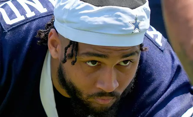 FILE - Dallas Cowboys defensive end Marshawn Kneeland runs drills during NFL football training camp Thursday, July 25, 2024, in Oxnard, Calif. (AP Photo/Ryan Sun, File)