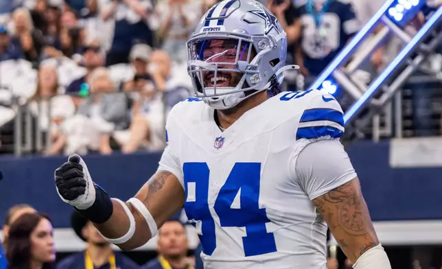 FILE - Dallas Cowboys defensive end Marshawn Kneeland takes the field before a football game against the New York Giants, Sunday, Sept. 14, 2025, in Arlington, Texas. (AP Photo/Jeffrey McWhorter, File)