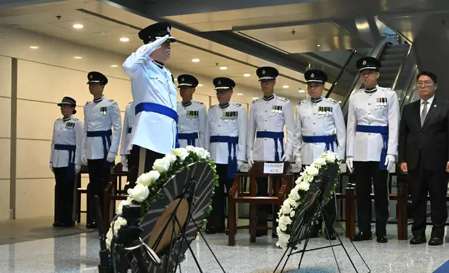 Police pay tribute to fallen police officers  Source: HKSAR Government Press Releases