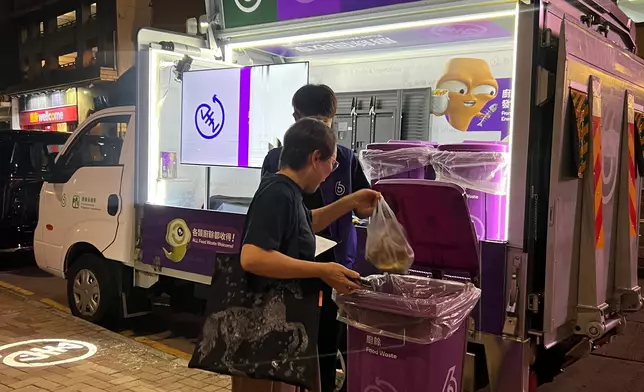 DEP inspects operation of food waste recycling truck and calls on public to cast votes in Legislative Council General Election  Source: HKSAR Government Press Releases