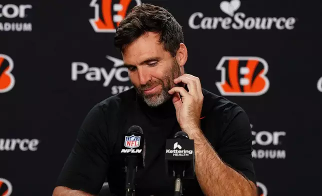 Cincinnati Bengals quarterback Joe Flacco (16) speaks after his team's loss to the Chicago Bears in an NFL football game, Sunday, Nov. 2, 2025, in Cincinnati. (AP Photo/Jeff Dean)
