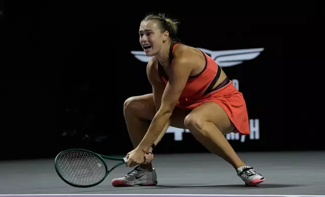 Aryna Sabalenka of Belarus reacts against Elena Rybakina of Kazakhstan during their women's final singles match of the WTA finals in Riyadh, Saudi Arabia, Saturday, Nov. 8, 2025. (AP Photo/ Fatima Shbair)