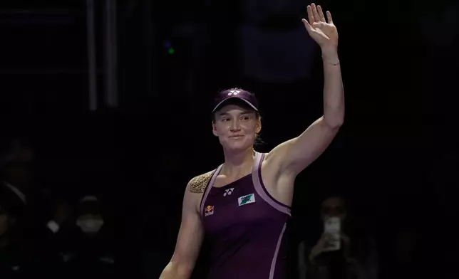Elena Rybakina of Kazakhstan celebrates after defeating Aryna Sabalenka of Belarus in the women's final singles match of the WTA finals in Riyadh, Saudi Arabia, Saturday, Nov. 8, 2025. (AP Photo/ Fatima Shbair)