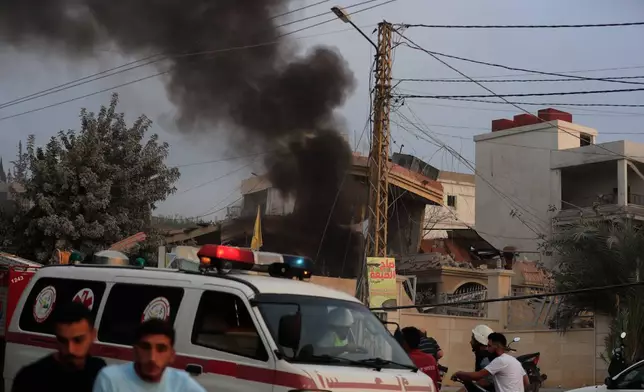 Smoke rises following an Israeli airstrike in the village of Teir Debba, southern Lebanon, Thursday, Nov. 6, 2025. (AP Photo/Mohammad Zaatari)