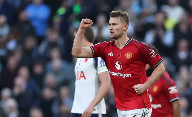 Manchester United's Matthijs de Ligt celebrates after scoring his side's second goal during the English Premier League soccer match between Tottenham Hotspur and Manchester United in London, England, Saturday, Nov. 8, 2025. (AP Photo/Ian Walton)