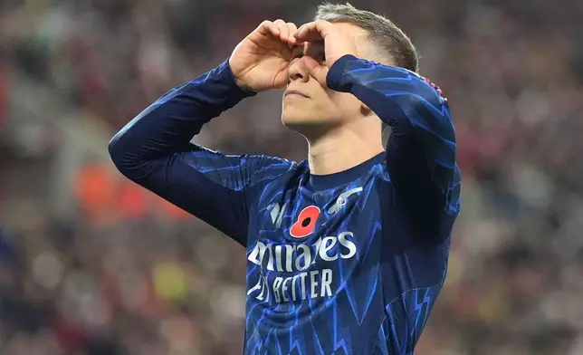 Arsenal's Leandro Trossard celebrates scoring their side's second goal of the game during the English Premier League soccer match between Arsenal and Sunderland, in Sunderland, England, Saturday Nov. 8, 2025. (Owen Humphreys/PA via AP)