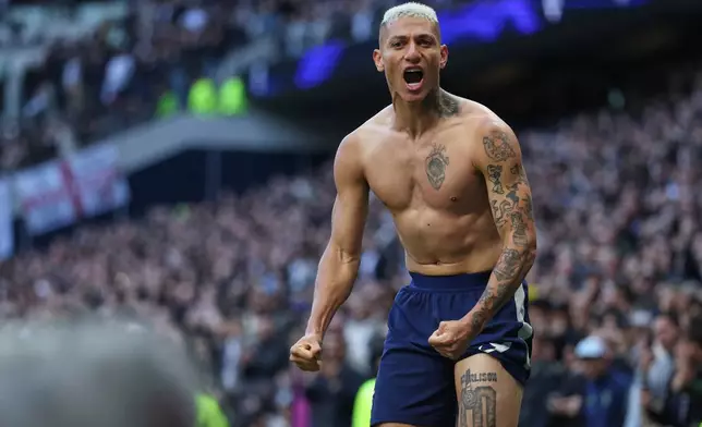 Tottenham's Richarlison celebrates after scoring his side's second goal during the English Premier League soccer match between Tottenham Hotspur and Manchester United in London, England, Saturday, Nov. 8, 2025. (AP Photo/Ian Walton)