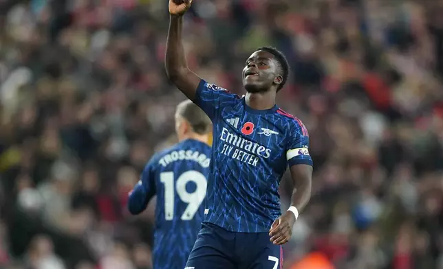 Arsenal's Bukayo Saka celebrates scoring their side's first goal during the English Premier League soccer match between Arsenal and Sunderland, in Sunderland, England, Saturday Nov. 8, 2025. (Owen Humphreys/PA via AP)