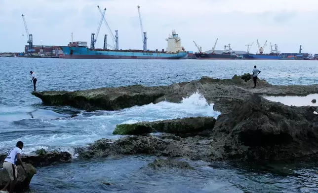 People enjoy the afternoon at the public beach in Mogadishu, Somalia, Thursday, Nov. 6, 2025. (AP Photo/Farah Abdi Warsameh)