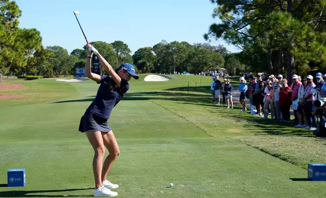 Kai Trump, granddaughter of President Donald Trump, tees off on the 15th hole during the first round of The Annika LPGA golf tournament Thursday, Nov. 13, 2025, in Belleair, Fla. (AP Photo/Chris O'Meara)