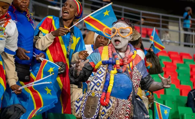 Supporters of Congo cheer their national team ahead of World Cup African qualifier soccer match against Nigeria, in Rabat, Morocco, Sunday, Nov. 16, 2025. (AP Photo)
