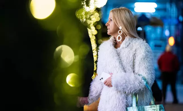 Black Friday Shoppers arrive to Macy's flagship store in New York on Friday, Nov. 28, 2025. (AP Photo/Angelina Katsanis)