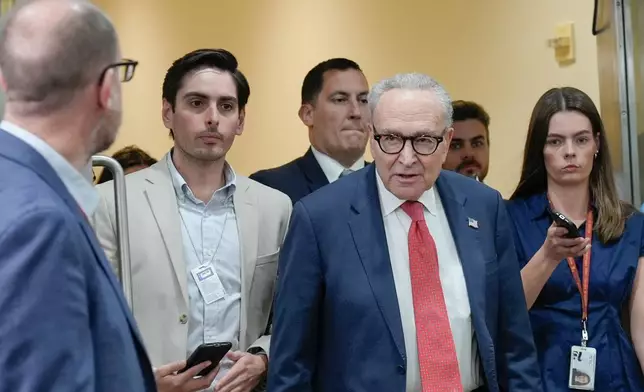 Sen. Minority Leader Chuck Schumer of N.Y., speaks with reporters at the Capitol Subway on day 36th of the government shutdown, Wednesday, Nov. 5, 2025, in Washington. (AP Photo/Mariam Zuhaib)