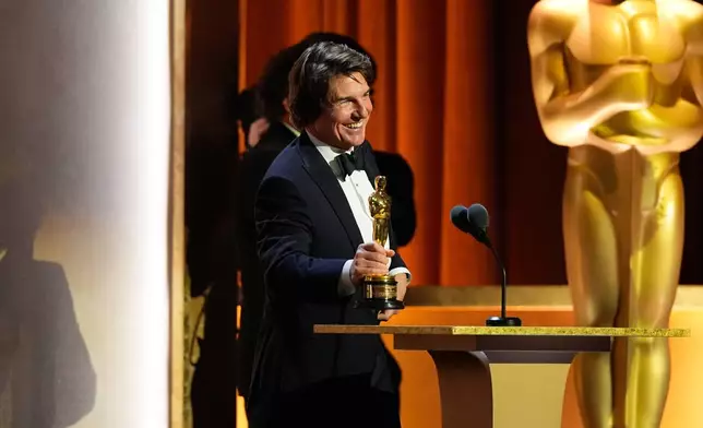 Tom Cruise receives an Academy honorary award during the 16th Governors Awards on Sunday, Nov. 16, 2025, at The Ray Dolby Ballroom in Los Angeles. (AP Photo/Chris Pizzello)