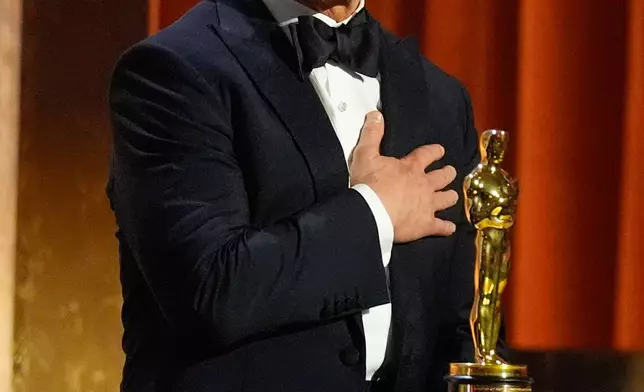Tom Cruise receives an Academy honorary award during the 16th Governors Awards on Sunday, Nov. 16, 2025, at The Ray Dolby Ballroom in Los Angeles. (AP Photo/Chris Pizzello)