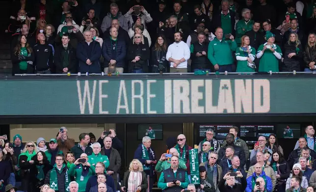 Supporters react ahead of the rugby international between the All Blacks and Ireland in Chicago, Saturday, Nov. 1, 2025. (AP Photo/Erin Hooley)