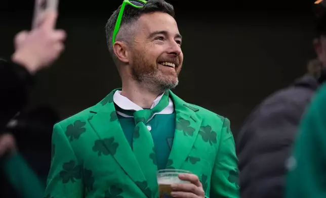 A Irish supporter reacts during the halftime break in the rugby international between the All Blacks and Ireland in Chicago, Saturday, Nov. 1, 2025. (AP Photo/Erin Hooley)