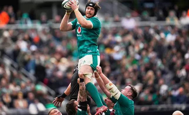 Ireland's Ryan Baird wins a lineout during the rugby international between the All Blacks and Ireland in Chicago, Saturday, Nov. 1, 2025. (AP Photo/Erin Hooley)