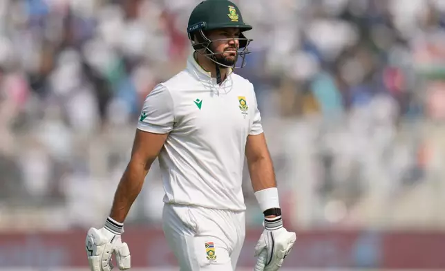 South Africa's Aiden Markram walks off the field after losing his wicket on the first day of the first cricket test match between India and South Africa in Kolkata, India, Friday, Nov. 14, 2025. (AP Photo/Aijaz Rahi)