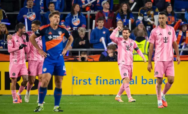 Inter Miami forward Lionel Messi, second from right, celebrates after scoring during the first half of MLS soccer's Eastern Conference semifinal against FC Cincinnati, Sunday, Nov. 23, 2025, in Cincinnati. (AP Photo/Tanner Pearson)