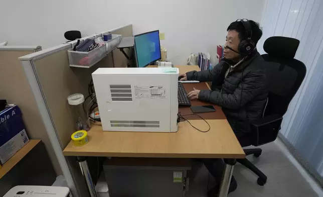 HOLD - Kim Ki-sung, a staff of the Free North Korea Radio station, works at his office in Seoul, South Korea, Monday, Nov. 17, 2025. (AP Photo/Ahn Young-joon)