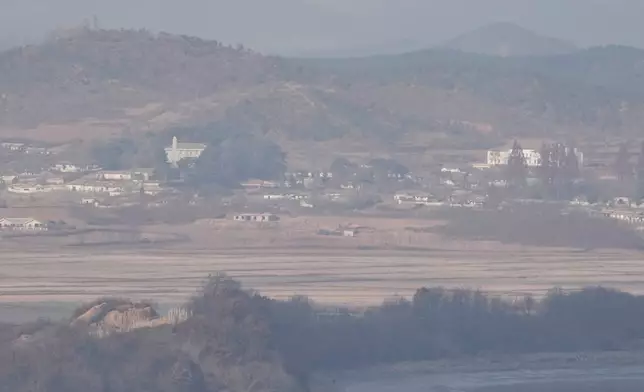 North Korea's Kaepoong town is seen from the Unification Observation Post in Paju, South Korea, Saturday, Nov. 22, 2025. (AP Photo/Ahn Young-joon)