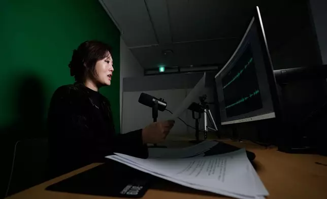 Lee Si-young, head of the Free North Korea Radio station, demonstrates how to record her station's radio programs at her office in Seoul, South Korea, Monday, Nov. 17, 2025. (AP Photo/Ahn Young-joon)
