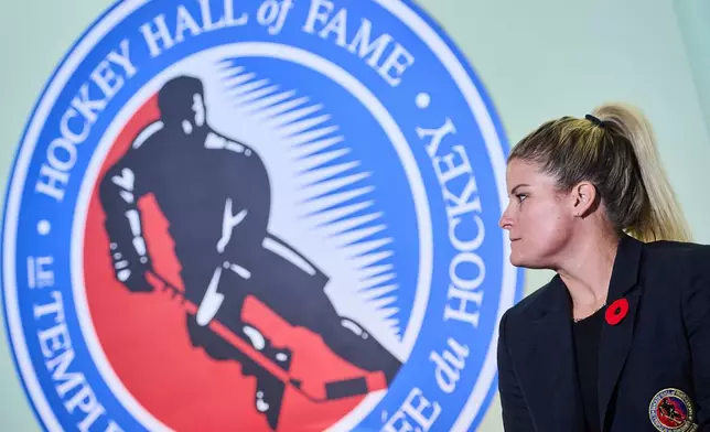 Hockey Hall of Fame inductee Brianna Decker gives remarks in Toronto on Saturday, Nov. 8, 2025. (Sammy Kogan/The Canadian Press via AP)