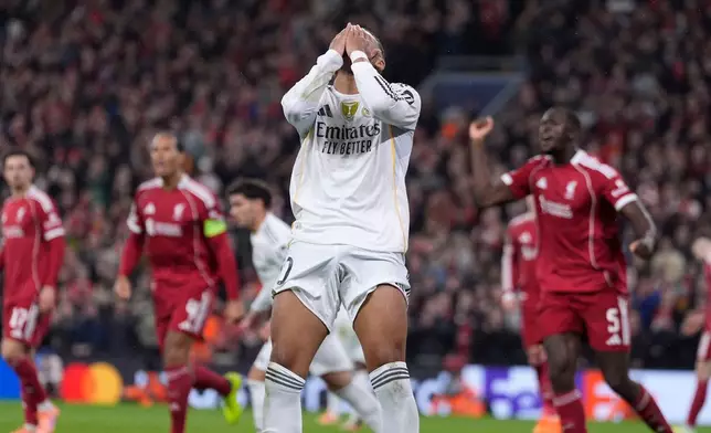 Real Madrid's Kylian Mbappe reacts during the Champions League soccer match between Liverpool and Real Madrid in Liverpool, England, Tuesday, Nov. 4, 2025. (Peter Byrne/PA via AP)