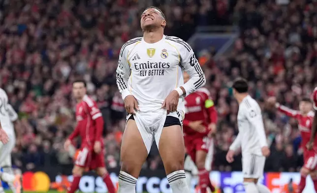 Real Madrid's Kylian Mbappe reacts during the Champions League soccer match between Liverpool and Real Madrid in Liverpool, England, Tuesday, Nov. 4, 2025. (Peter Byrne/PA via AP)