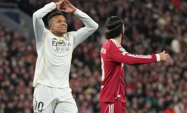 Real Madrid's Kylian Mbappe reacts during the Champions League soccer match between Liverpool and Real Madrid in Liverpool, England, Tuesday, Nov. 4, 2025. (AP Photo/Jon Super)