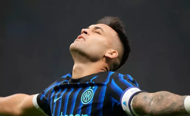 Inter Milan's Lautaro Martinez celebrates after scoring his side's opening goal during a Serie A soccer match between Inter Milan and Lazio, in Milan, Italy, Sunday, Nov. 9, 2025. (AP Photo/Luca Bruno)