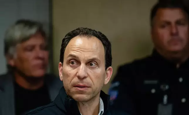 Mayor Craig Greenberg speaks at Louisville Regional Airport Authority about the crash of UPS Flight 2796 at Louisville Muhammad Ali International Airport on Tuesday, Nov. 4, 2025, in Louisville, Ky. (AP Photo/Jon Cherry)