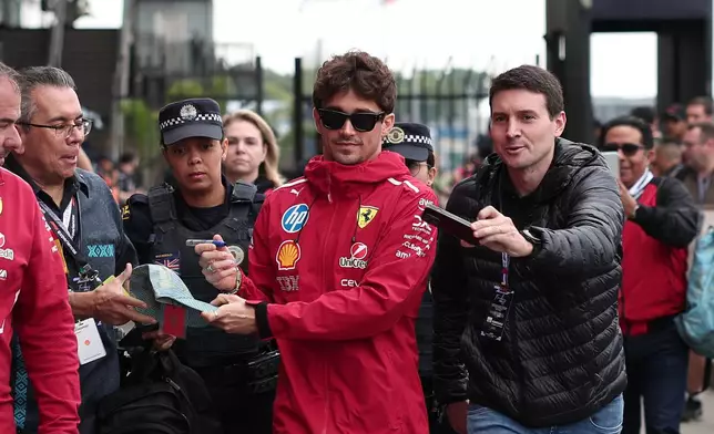 Ferrari driver Charles Leclerc of Monaco, arrives at the Interlagos race track ahead of the Brazilian Formula One Grand Prix in Sao Paulo, Friday, Nov. 7, 2025. (AP Photo/Ettore Chiereguini)