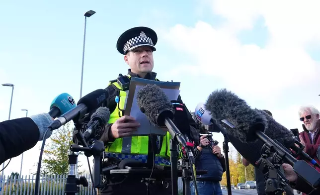 Police Superintendent John Loveless addresses the media after a mass stabbing on a London-bound train in Huntingdon, England, Sunday, Nov. 2, 2025.(AP Photo/Kirsty Wigglesworth)