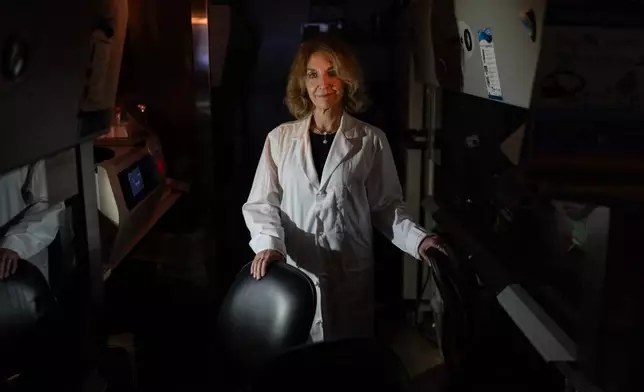 Dr. Mariana Kaplan, chief of the National Institute of Arthritis and Musculoskeletal and Skin Diseases at the National Institutes of Health, poses for a portrait in her lab, Monday, Aug. 25, 2025, in Washington. (AP Photo/David Goldman)