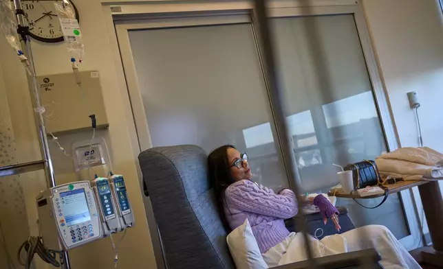 Ruth Wilson, whose lupus took six years to diagnose, receives her monthly lupus-focused IV treatment at UMass Memorial Medical Center, Tuesday, Jan. 14, 2025, in Worcester, Mass. (AP Photo/David Goldman)