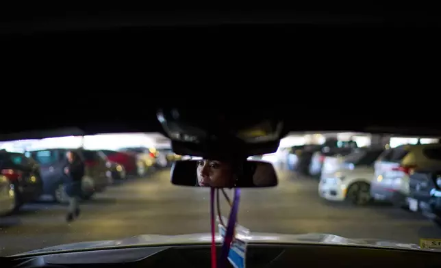 Ruth Wilson looks for a parking spot as she arrives for her monthly lupus-focused IV treatment at UMass Memorial Medical Center, Tuesday, Jan. 14, 2025, in Worcester, Mass. (AP Photo/David Goldman)