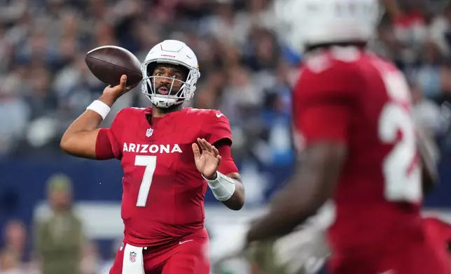 Arizona Cardinals quarterback Jacoby Brissett (7) throws a pass in the first half of an NFL football game against the Dallas Cowboys Monday, Nov. 3, 2025, in Arlington, Texas. (AP Photo/Julio Cortez)