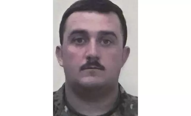 This photo provided by the U.S. Attorney's Office on Thursday, Nov. 27, 2025, shows National Guard member Staff Sgt. Andrew Wolfe. (U.S. Attorney's Office via AP)