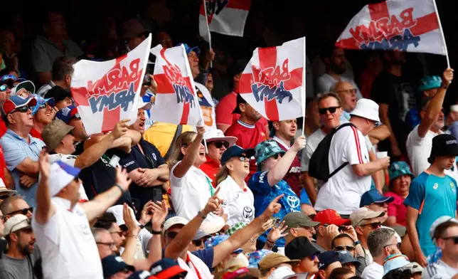 England's fans cheer on their team on day two of the first Ashes cricket test match between Australia and England in Perth, Saturday, Nov. 22, 2025.(AP Photo/Gary Day)