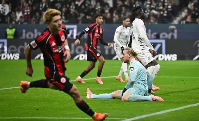 Frankfurt's Ritsu Doan celebrates after scoring during the German Bundesliga soccer match between Eintracht Frankfurt and FSV Mainz 05 in Frankfurt, Germany, Sunday, Nov. 9, 2025. (Arne Dedert/dpa via AP)
